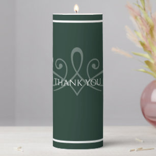 Emerald green and white pillar candle
