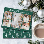 Emerald Green Merry Christmas Photo Collage Holiday Card<br><div class="desc">Trendy emerald green holiday cards with chic handwritten scrawl MERRY CHRISTMAS above your family photo collage of your 5 favorite 2025 pictures. The beautiful back features a pattern of white hand drawn pine and fire trees. Modern elegant Christmas cards featuring one vertical photograph in the center and 4 square pictures...</div>