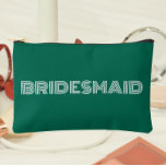 Emerald Green Modern Typography Bridesmaid Accessory Pouch<br><div class="desc">Solid emerald green color, small style, zippered cosmetic bag for your wedding bridesmaid that features the word, BRIDESMAID in large, modern typography on one side of bag. Perfect as a travel accessory pouch to hold makeup, perfume, and jewelry. You may personalize by adding bridesmaid name if desired to pouch. Available...</div>