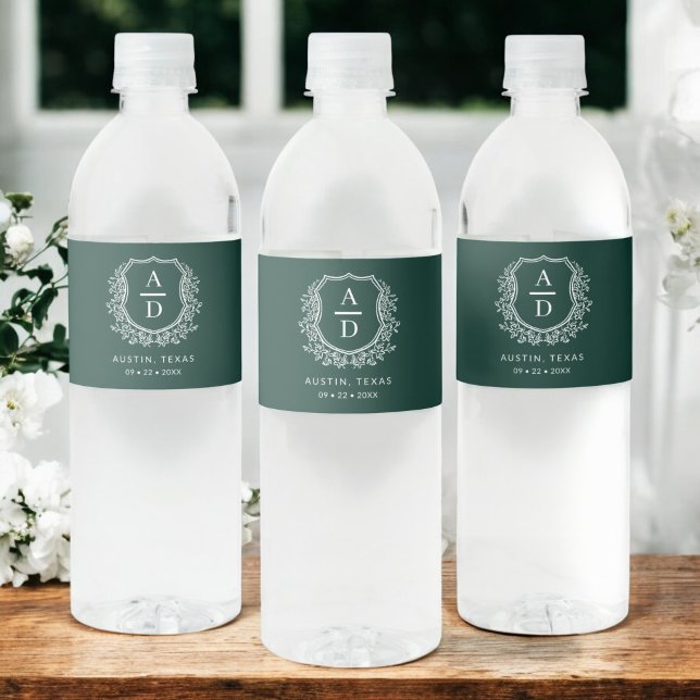 Emerald Green Monogram Wedding Floral Crest Water Bottle Label (Creator Uploaded)