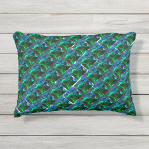 Emerald green under a grid with a metallic tone outdoor pillow