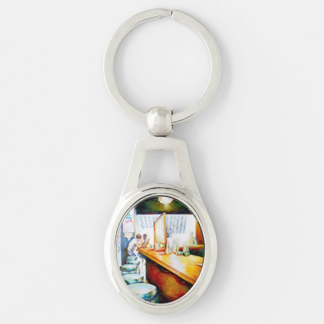 Emotional to Motivate, Logic to Justify Keychain (Front)