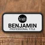 Employee Badge with Logo Name Title Black White<br><div class="desc">Add your company logo for a classic, corporate design for your workers. A simple employee name patch in black and white with a simple design that you can add the employee name for a work shirt or hat. Or you can add 2 lines of text - name and title. Add...</div>