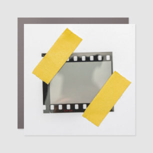 Empty 35mm film frame, yellow strips. car magnet