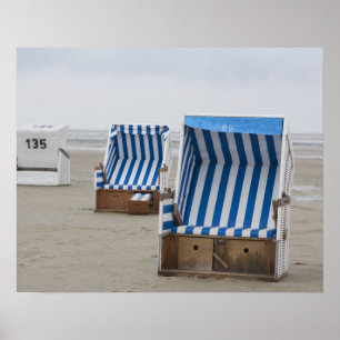 empty beach chairs on beach poster