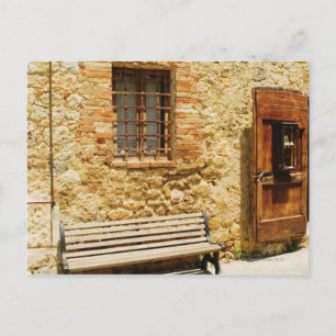 Empty bench in front of a wall, Monteriggioni, Postcard