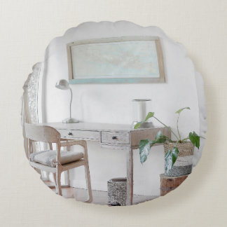 EMPTY DESK NEAR CURTAIN ROUND PILLOW