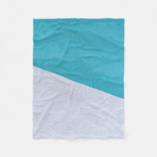 Empty gray floor beside pool fleece blanket