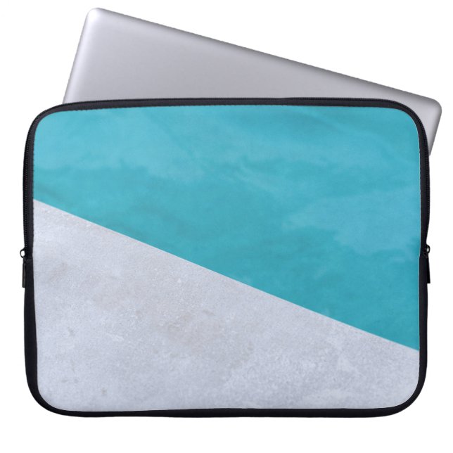 Empty gray floor beside pool laptop sleeve (Front)