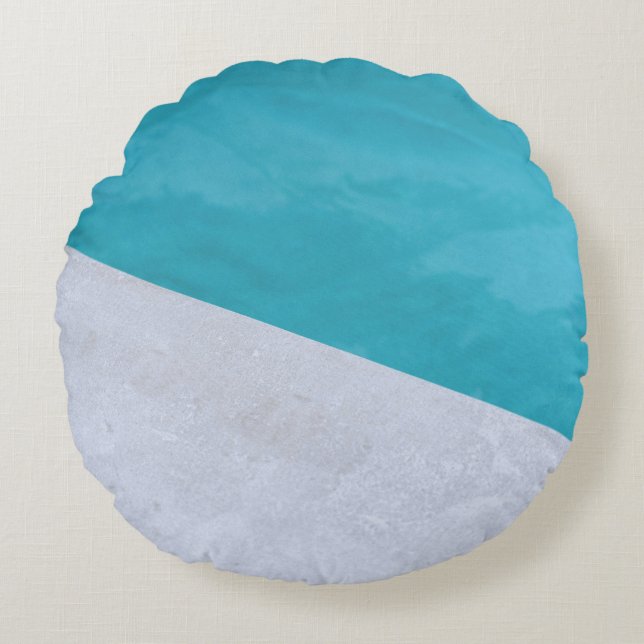 Empty gray floor beside pool round pillow (Front)