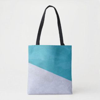 Empty gray floor beside pool tote bag