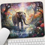 Enchanted Forest Elephant Personalized Mouse Pad<br><div class="desc">Transform your workspace into a magical sanctuary with this personalized mouse pad featuring an enchanting elephant amidst a mystical forest. The gentle giant, adorned with intricate details and surrounded by vibrant flora, creates a captivating scene, inspiring creativity and wonder. Make it truly yours by adding your name or a special...</div>