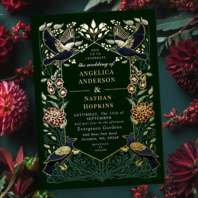 A wedding invitation inspired by The Raven by Edgar Allan Poe, sitting on a dark green table surrounded by snapdragons and dahlias.