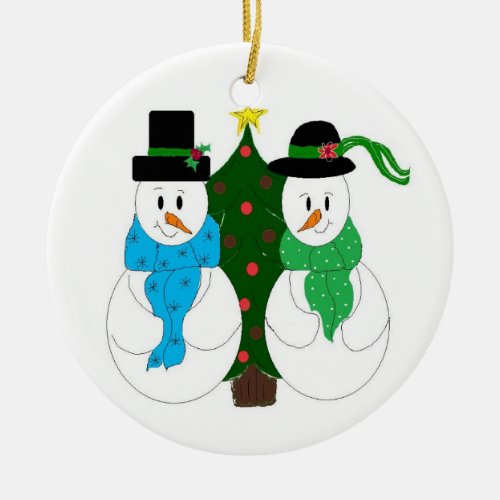 Enchanting Snow Couple Trimmed in Green Ceramic Ornament