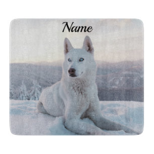 Enchanting White Husky Dog in the snow Cutting Board