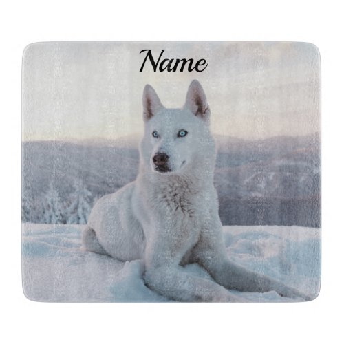 Enchanting White Husky Dog in the snow Cutting Board