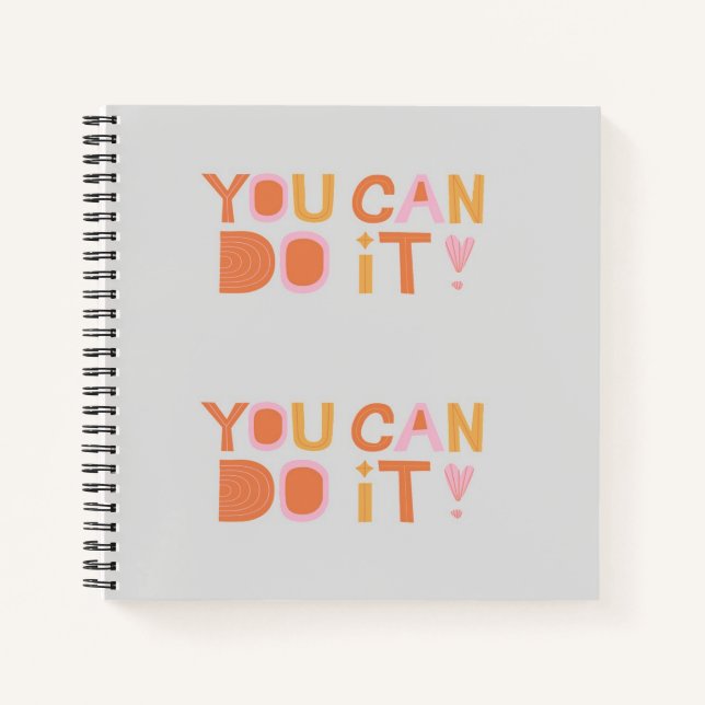 Encouragement text on gray notebook (Front)