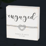 Engaged Heart Knot Modern Script Keepsake Wooden Box Sign<br><div class="desc">Modern and simple wooden box sign gift for a newly engaged couple! The typography text says "Engaged" in a script font. There is also an illustration of a rope tied in a heart knot. You can add the couple's names with a heart in-between and date on the bottom. Perfect way...</div>