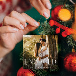 Engaged Overlay Minimal & Modern Couple Photo Ceramic Ornament<br><div class="desc">Minimal and modern couple's photo engagement ornament. Simple and modern design with a full photo design. Customize with your special engagement photo,  year,  and name. "Engaged" photo overlay in an elegant typography. Perfect keepsake ornament with couples celebrating their engagement and first Christmas engaged.</div>
