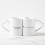 Engagement-Themed Lovers’ Mug (customizable)<br><div class="desc">Celebrate love’s harmony with Engaged in the Perfect Blend, a charming paired mug set designed for couples embarking on their shared journey. Each mug forms one half of a sweet union, coming together to complete the heartwarming design: two interlinked engagement bands in a sleek, gender-neutral style, framed by a pair...</div>