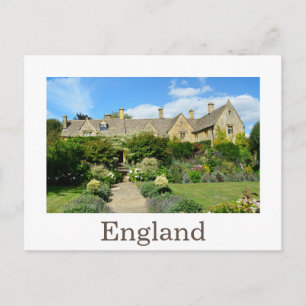 English house with flower garden postcard