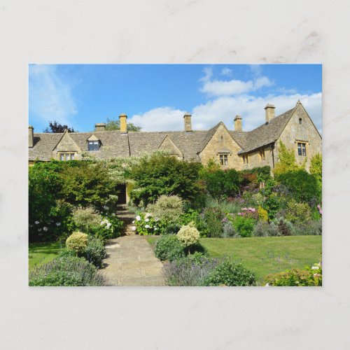 English house with flower garden postcard