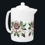 English Tudor Rose Teapot<br><div class="desc">The perfect pot for your afternoon cuppa. The familiar rose with the golden crown makes a great design on a set with our Tudor Rose mugs,  milk jug,  sugar jar,  and serving plate. Here's Cheers!</div>