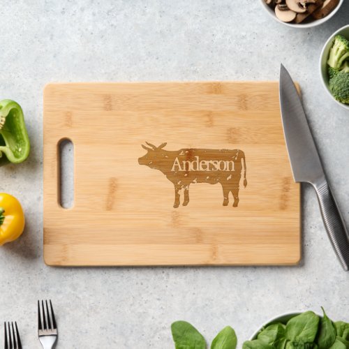 Engraved cutting board with personalized cow logo