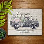 Enjoying the Ride Pink Floral Personalized Jigsaw Puzzle<br><div class="desc">A lovely faux sun bleached wooden background,  classic country step-side vintage truck filled with lovely watercolor flowers and sprays of eucalyptus leaves,  and the sentiment "Enjoying the ride together" with the bride and groom's names and "established" date.  This fun jigsaw puzzle makes the perfect newlywed,  housewarming or anniversary gift.</div>