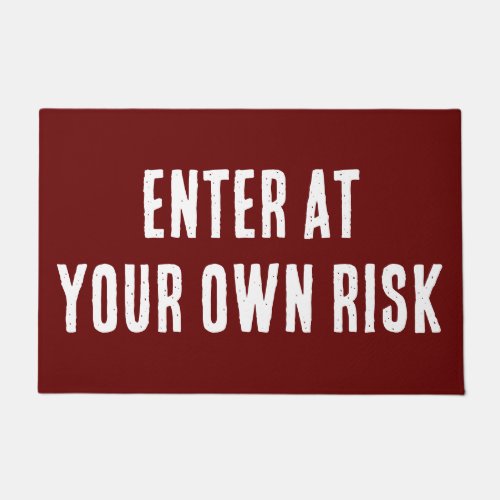 Enter at  Your own Risk Warning on a Doormat
