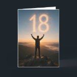 Epic 18th Birthday Mountain Sunrise  Card<br><div class="desc">Celebrate turning 18 with a card that feels like the start of an epic adventure. This striking design features the silhouette of a young man standing triumphantly on a rocky mountain peak at sunrise, arms raised in victory as the glowing number “18” appears in the sky like illuminated clouds. The...</div>