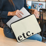 etc. Clean Simple Beige & Black Bold Typography  Laptop Sleeve<br><div class="desc">The ETC. Clean Simple Beige & Black Bold Typography Laptop Sleeve features an elegant design with bold black typography on a sleek beige background. Made from high-quality materials, this laptop sleeve provides excellent protection for your device while maintaining a minimalist aesthetic. Its slim, form-fitting design ensures easy portability, making it...</div>