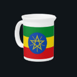 Ethiopia Flag Pitcher<br><div class="desc">This Ethiopia Flag Pitcher is a striking piece that combines practicality with a celebration of national pride. Featuring the vibrant green, yellow, red, and blue colors of the Ethiopian flag, this pitcher is perfect for serving beverages at home or during special occasions. The iconic flag design adds a meaningful touch...</div>