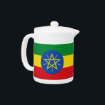 Ethiopia Flag Teapot<br><div class="desc">This Ethiopia Flag Teapot combines functionality with national pride, offering a beautiful way to serve your favorite tea while celebrating the vibrant colors and symbolism of the Ethiopian flag. The teapot features the iconic green, yellow, and red colors of the flag, along with the blue circle and star emblem, making...</div>