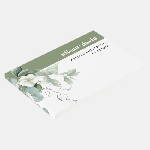 Eucalyptus branch and white flowers wedding guest book