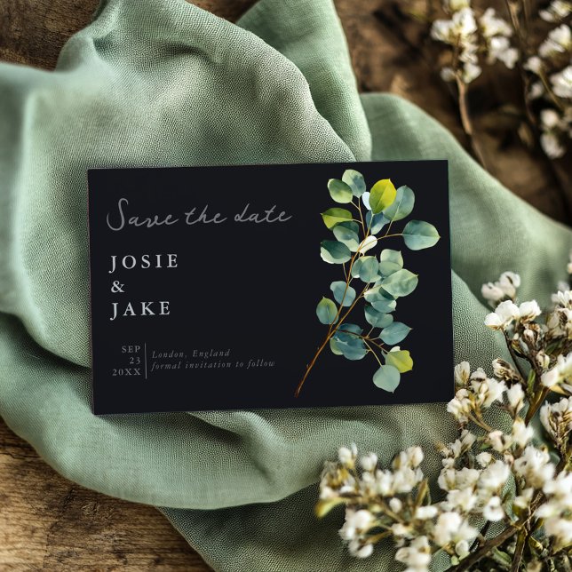 Eucalyptus branch green leaves dark save the date (Dark card with eucalyptus branch and elegant white text.)