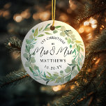 Eucalyptus Newlyweds 1st Christmas Mrs & Mrs Ceramic Ornament<br><div class="desc">For the Mrs. and Mrs. Lesbian Newlyweds. Customize the text and background color for your event. Eucalyptus watercolor wreath can be scaled or removed. Photo on back.</div>