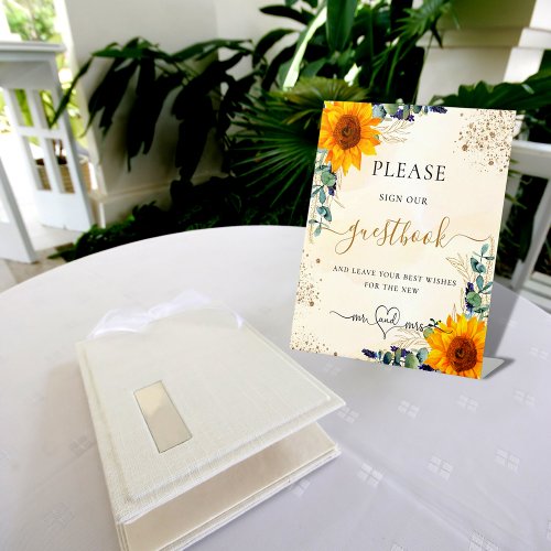 Eucalyptus sunflowers wedding sign our guest book
