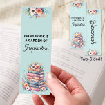 Every Book is a Garden Personalized Floral Bookmarks<br><div class="desc">Add a touch of floral charm to your reading routine with this personalized inspirational bookmark, featuring the uplifting quote: “Every book is a garden of inspiration.” This delightful design includes a pastel blue background, stacked vintage-style books, and whimsical flowers bursting with color and life. The front of the bookmark showcases...</div>