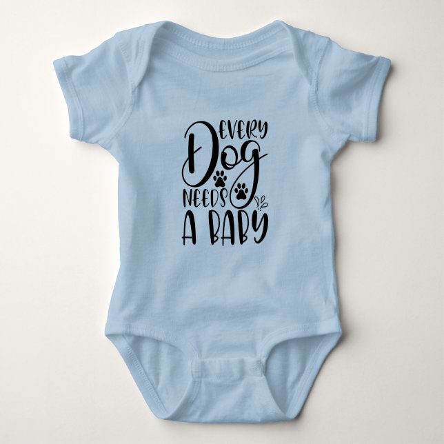 Every Dog Needs A Baby Pregnancy Announcement Baby Bodysuit (Front)