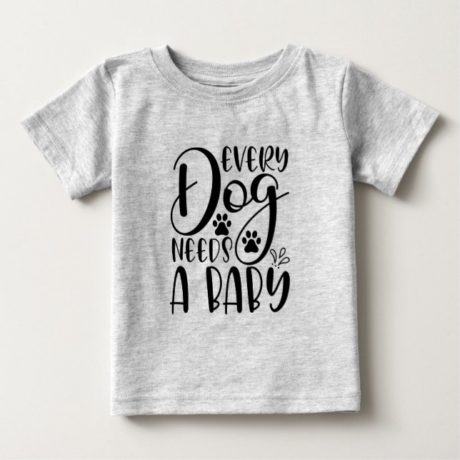 Every Dog Needs A Baby Pregnancy Announcement Baby T-Shirt (Front)