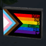 Everyone is Welcome Here (Progress Pride) Flag Wooden Box Sign<br><div class="desc">LGBTQ  Pride Apparel for Everyone!
Browse over 10, 000  Pride and Flag Gifts including LGBTQ  Activism,  Equality and Culture Designs.  The Most Unique Gay,  Lesbian Bi,  Trans,  Queer  Apparel on the web. Shop now and find your own style from GAY to Z:  http://www.LgbtShirts.com</div>