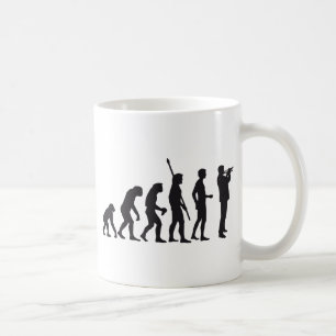 evolution trumpet player coffee mug