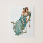 Exotic Art Nouveau Beauty in Teal Robes Jigsaw Puzzle<br><div class="desc">Beautiful and exotic vintage art nouveau style beauty in flowing teal robes and ornate orange headdress sitting in an elaborate chair. Restored illustration has faux gilt highlights and background color is editable.</div>