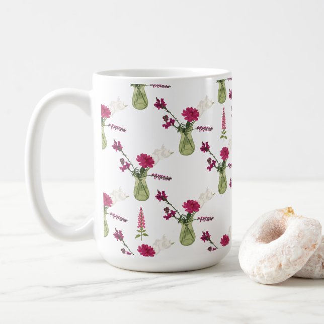 Exotic flower arrangement in glass coffee mug (With Donut)