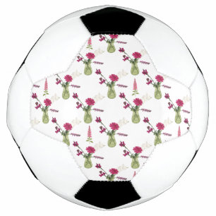 Exotic flower arrangement in glass soccer ball