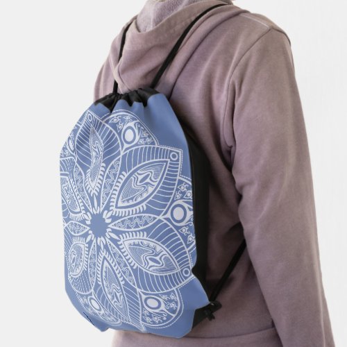Exotic White Mandala on Blue Background Drawstring Bag