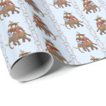 Extinct Animal Wrapping Paper<br><div class="desc">Four kinds of extinct animals--ground sloths,  woolly mammoths,  saber-toothed tigers,  and dodos--dressed and ready for winter hijinks. See the coordinating gift sticker.</div>