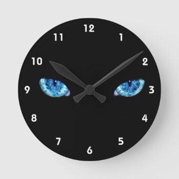 Eyes On Black Background Round Clock by customizedgifts at Zazzle