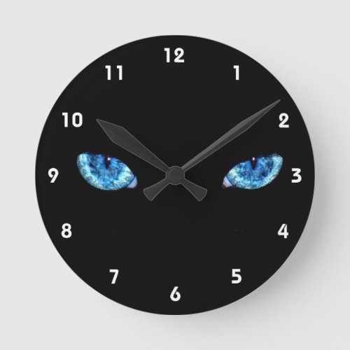 Eyes on black background round clock